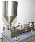 Used Wenzhou Rigao Table Top Semi Automatic Piston Filler, Model DYF. 316L Stainless steel product contact. Filling speed 5 to 20 bottles per minute. Filling accuracy /= 1% +/-. Filling range: approx...